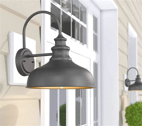 This farmhouse barn-style outdoor wall-mounted sconce light features a gooseneck and dark sky metal shade, finished in matte black and copper inside, weather-resistant and rust proof, which is an ideal outdoor wall light selection for the front doorway, porch, driveway, backyard, or garage to enhance vintage, farmhouse, rustic, or even coastal. . Gooseneck barn lights